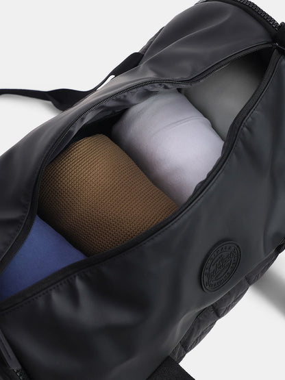 BLACK QUILTED DUFFLE BAG